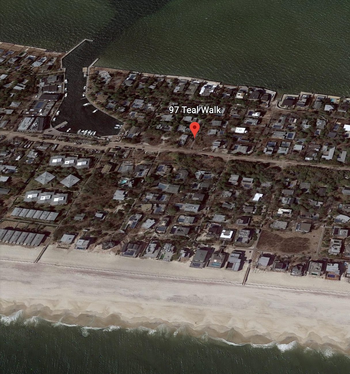 Google Earth context image showing 97 Teal Walk in relation to Fire Island Pines, the harbor, and surrounding area.